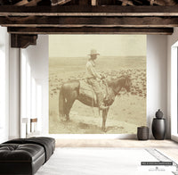 Large wall art of a Western cowboy rancher in sepia tones for home decor.