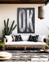 Elegant 'OK' vinyl banner celebrating Oklahoma's spirit, combines functionality with minimalist design for patios and interiors.