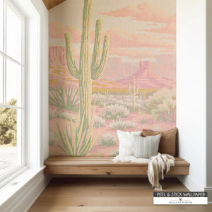 Pink desert mural with vintage paint-by-number cacti and mountains in dusty rose and peach tones.