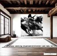 Statement wall mural of barrel racer, black and white photo for impactful decor.