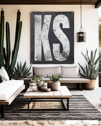 Weather-resistant 'KS' Kansas banner, capturing the state's unique identity with elegant typography, suitable for any home or garden setting.