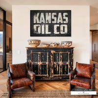 Kansas Oil Co. vintage canvas featuring a rustic cowboy-style oilfield sign with Western appeal.