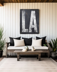 Durable 'LA' outdoor banner, a testament to Louisiana's enduring spirit, blending Western boho style with the state's traditional aesthetics for versatile decor.