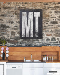 Montana-themed vinyl banner featuring the Rocky Mountains and open plains.