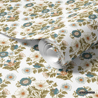 Vintage-inspired floral wallpaper with slate blue accents for cottage core interiors.