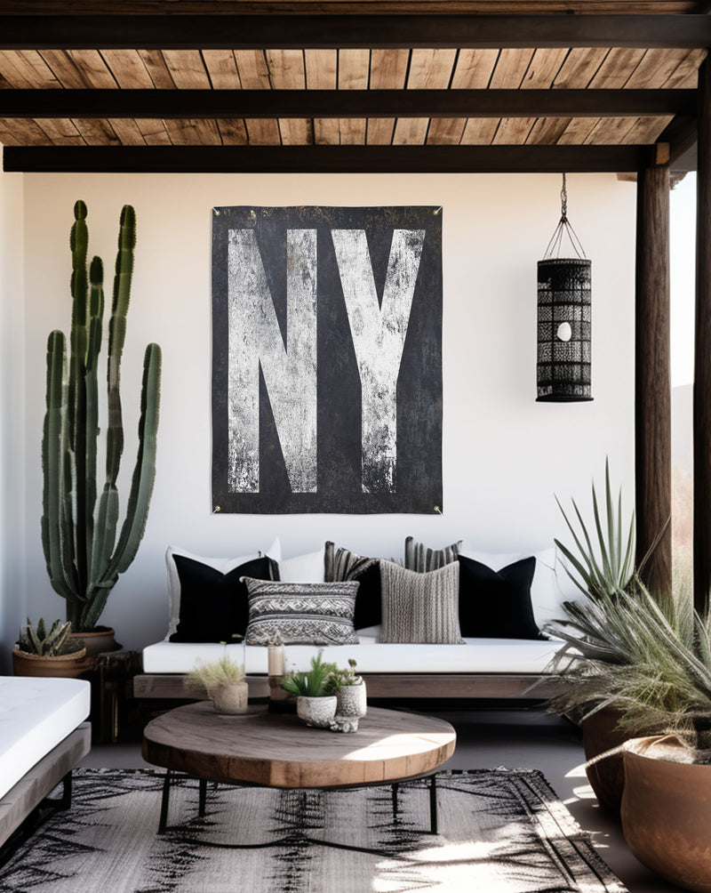 Minimalist yet bold 'NY' vinyl banner, a testament to New York's enduring spirit, designed for both indoor and outdoor elegance.