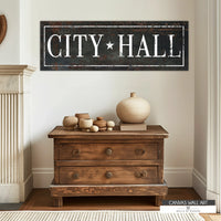 Vintage cowboy city hall canvas sign with distressed Western lettering, perfect for rustic and ranch-style decor.