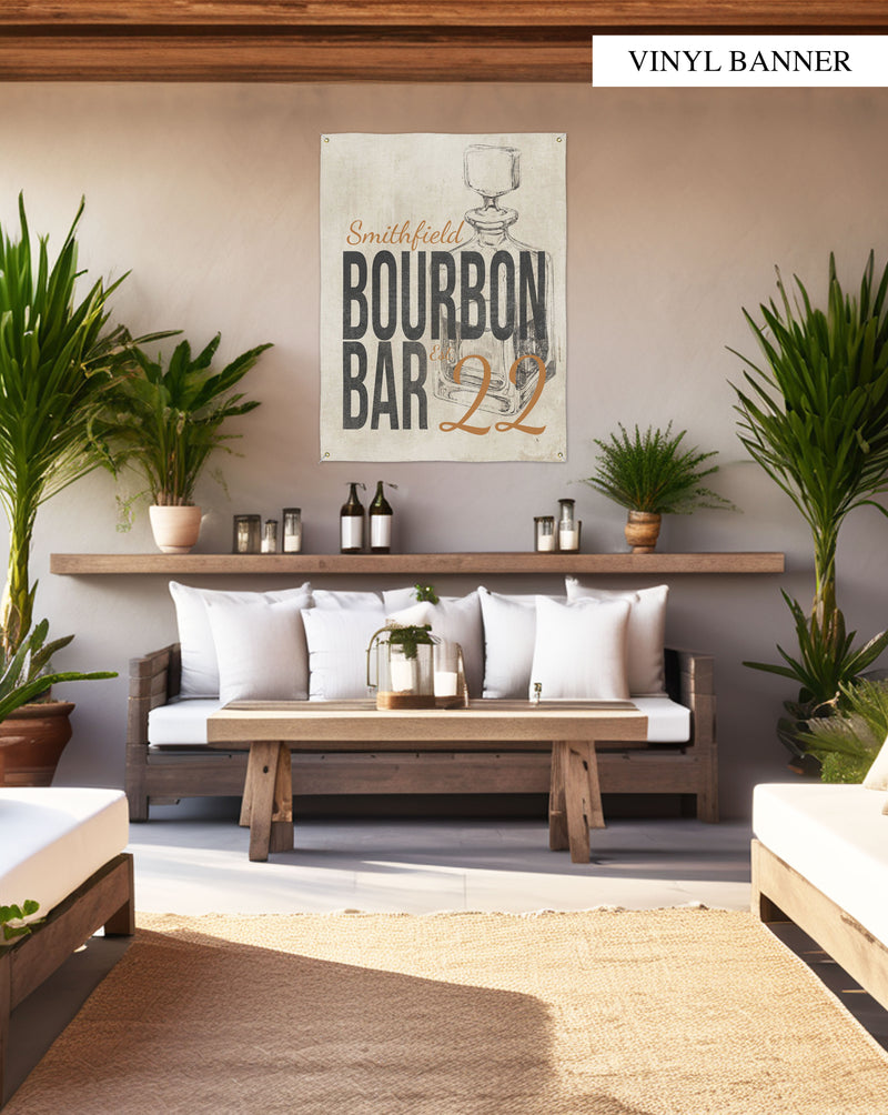 Personalize your space with a Retro Bourbon Bar vinyl banner, featuring a weathered linen look and classic decanter design for walls or porches.