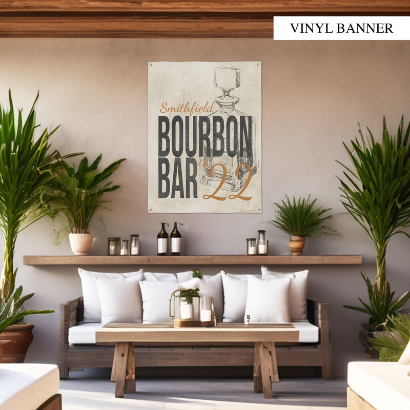 Personalize your space with a Retro Bourbon Bar vinyl banner, featuring a weathered linen look and classic decanter design for walls or porches.