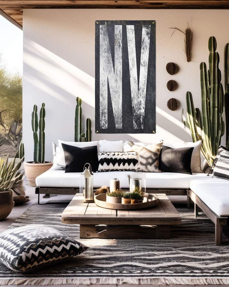 Minimalist Nevada 'NV' tapestry, a nod to the Silver State's beauty and resilience, easy to set up for impactful home decor.