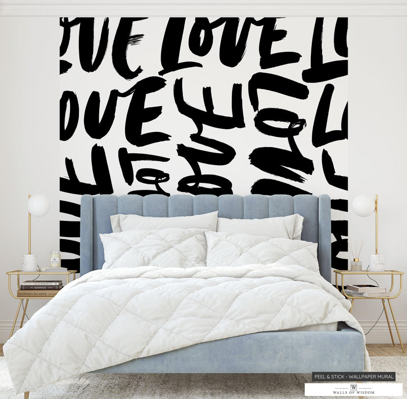 Maximalist home decor featuring bold 'Love' typography wallpaper for an artistic touch.