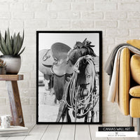 Vintage cowboy saddle canvas artwork for ranch and farmhouse decor.