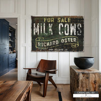 Vintage distressed 'Milk Cows for Sale' canvas sign with rustic farmhouse appeal in black, off-white, and yellow.