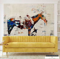 Innovative 'Wild at Heart' wallpaper with spray-painted effects on cowboy and horse figures.