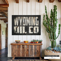 Vintage-inspired Wyoming Oil Co. wall art with distressed industrial textures for rustic decor