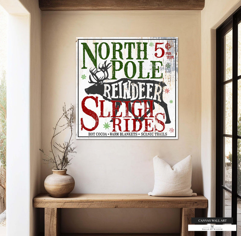 North Pole Reindeer Sleigh Rides Christmas canvas sign with vintage charm