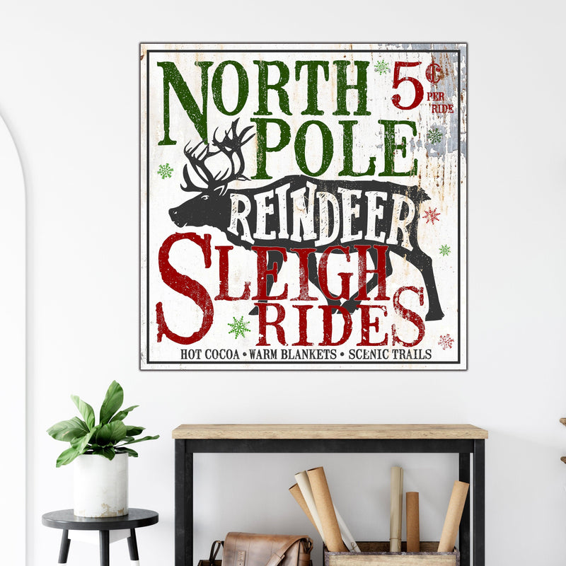 Rustic farmhouse Christmas wall art featuring reindeer sleigh rides design